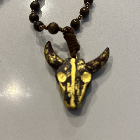 Steerhead wooden necklace with copper colored beds throughout - Picture 3 of 3